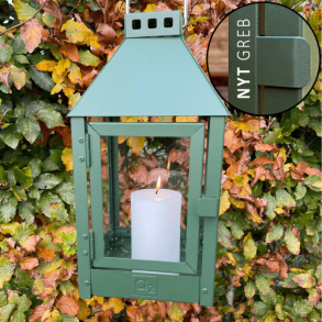 Olivgrna Lyktor Med Ljus