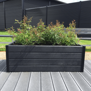 Blomsterkumme med hjul. Sorte hjrner. (Aflang)